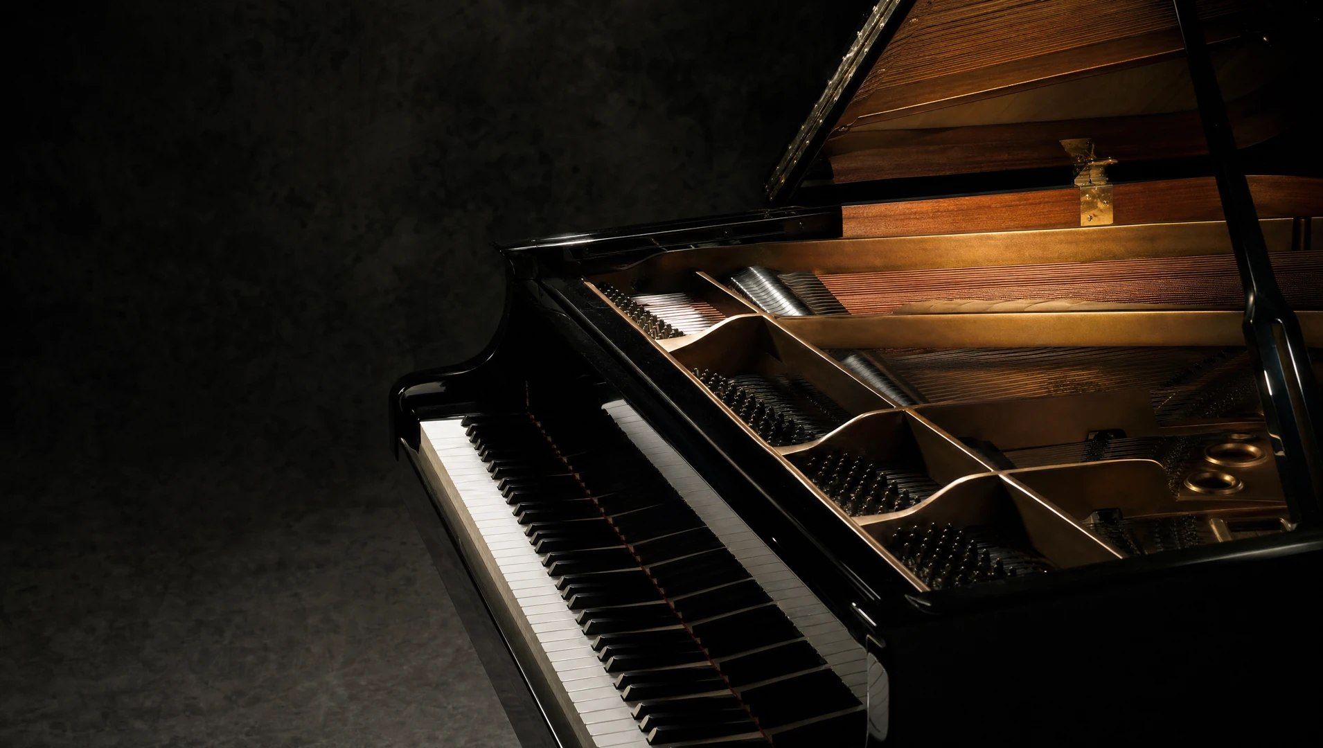 A sculptural music studio with instruments in soft silver light